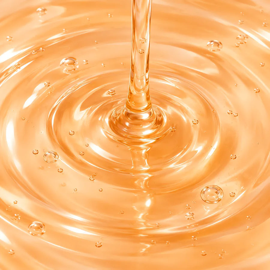 Clear serum pouring into a pool of serum